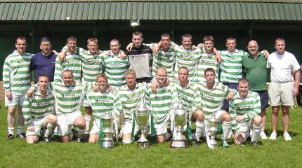 Dock Amateur Football Club with 4 Trophies