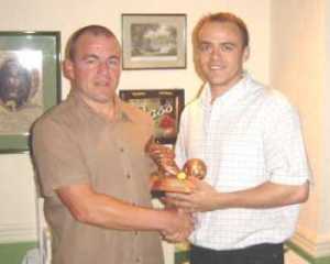 Dave Mayes picking up the Managers Player of the year award